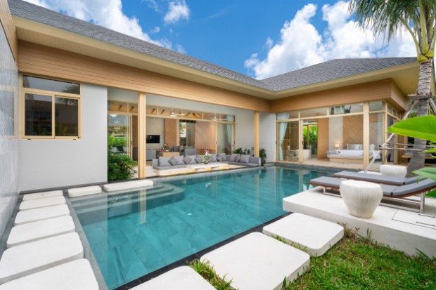 tropical-pool-villa-with-greenery-garden_41487-662